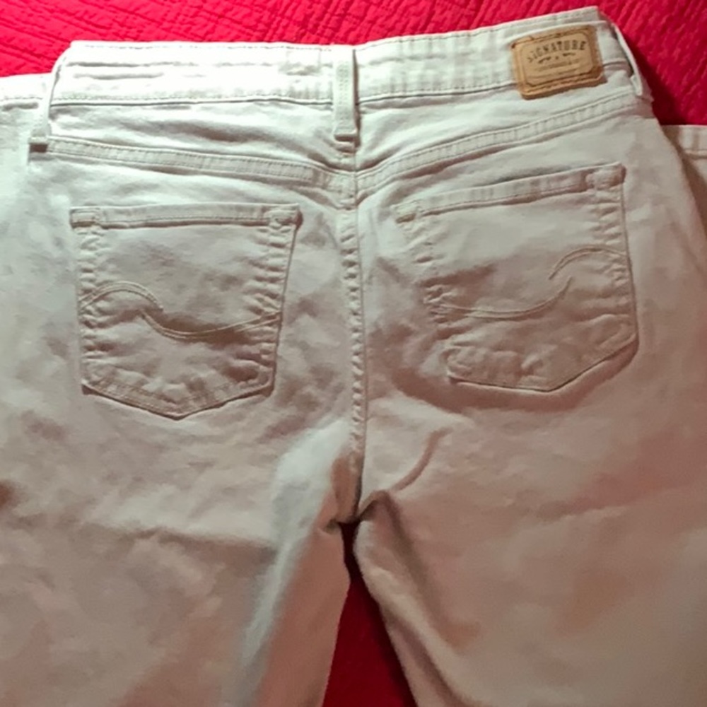 EUC TAN LEVI’S SIZE 4 BOOTCUT